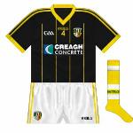 2012:
An early-season game with Fermanagh was played before the footballers' new set for the year had arrived and they wore a previously-unseen black version of the pinstriped jersey.