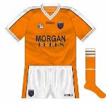 2001:
The Armagh jerseys first used in 2001 were a real new departure, as V-necks were unheard of in the GAA at the time while O'Neills usually put a county's crest on the sleeves. Numbers similar to those used in the Premiership were also used.