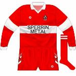 1993:
The previous, plainer, change jerseys, which had a narrower hoop, had the Sperrin Metals logo and Derry crest applied.