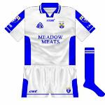2003:
Having drawn with Dublin wearing blue, white, which had been seen against Wicklow, was worn for the replay. Almost a reversal of the normal shirt, the side panels were larger, but not as big as they would become while the neck was also different.
