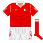 1991:
O'Neills began to introduce sleeve chevrons early in the 90s, often featuring county crests. Louth premiered their new style for the surprise win over Mick O'Dwyer's Kildare.