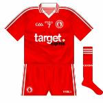 2010:
As in 2007, Monaghan were beaten in the Ulster final by a Tyrone side wearing an all-red kit. The Farney Men, having refused to change in '07, lined out in an all-blue kit. The 2010 kits had a slightly different crest to the preceding years.
