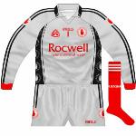 2008:
The long-sleeved version of the goalkeeper jersey featured red markings and cuffs, matching the socks, which were the same as the outfielders wore. Pascal McConnell wears his socks up but John Devine favours them down.
