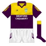 1993:
By the time the championship came around, Wexford had changed to Connolly jerseys though, on first view, not much had changed. Oddly, the shorts used were a previously-unseen O'Neills style while the sponsor was now in a plainer font.