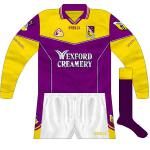 2002:
While the only pictorial evidence of this long-sleeved jersey if of it being worn by Leigh O'Brien in the Leinster SFC loss to Dublin, it may also have been used in league games.