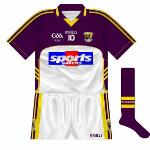 2009: 
Essentially this was identical to the regular jersey except that white replaced gold on the body, though the thin navy trim on the outfield shirt was absent here. Used against Roscommon in the 2009 football qualifiers.